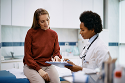 Patient being seen by doctor