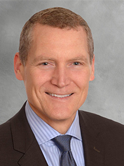 Paul Carr, CCIM/MBA, First Vice President, CBRE