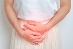 Woman in early pregnancy hold her stomach